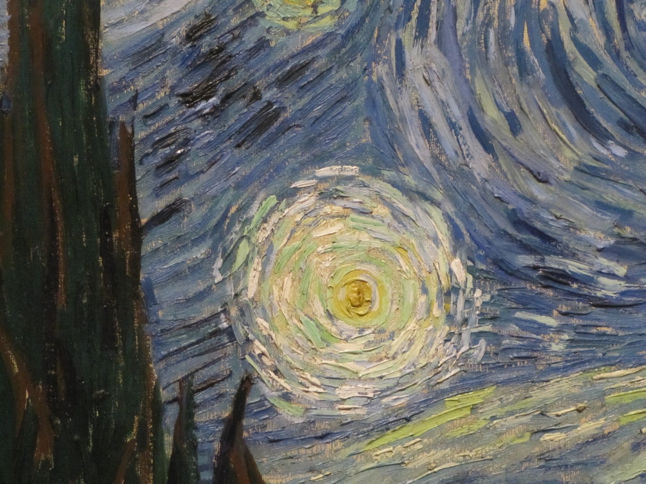 close-up of the bright star in the centre left of the painting The Starry Night